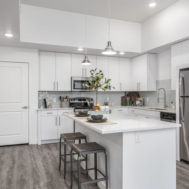 Rockpoint Apartments - Fully Equipped Kitchen with Modern Appliances and Breakfast Island Rockpoint Apartments - Fully Equipped Kitchen with Modern Appliances and Breakfast Island