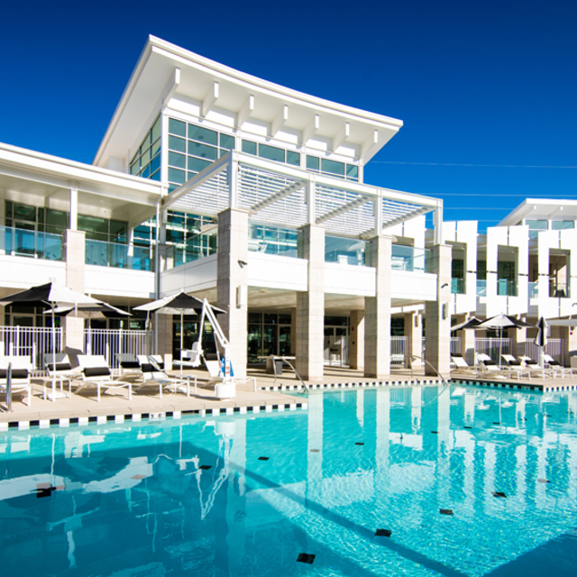 Rockpoint Apartment - Clubhouse Facade with Resort-Style Lap Pool Rockpoint Apartment - Clubhouse Facade with Resort-Style Lap Pool