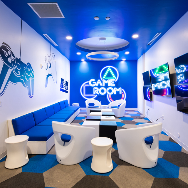 Rockpoint Apartments - Gaming Room with Huge Televisions Rockpoint Apartments - Gaming Room with Huge Televisions